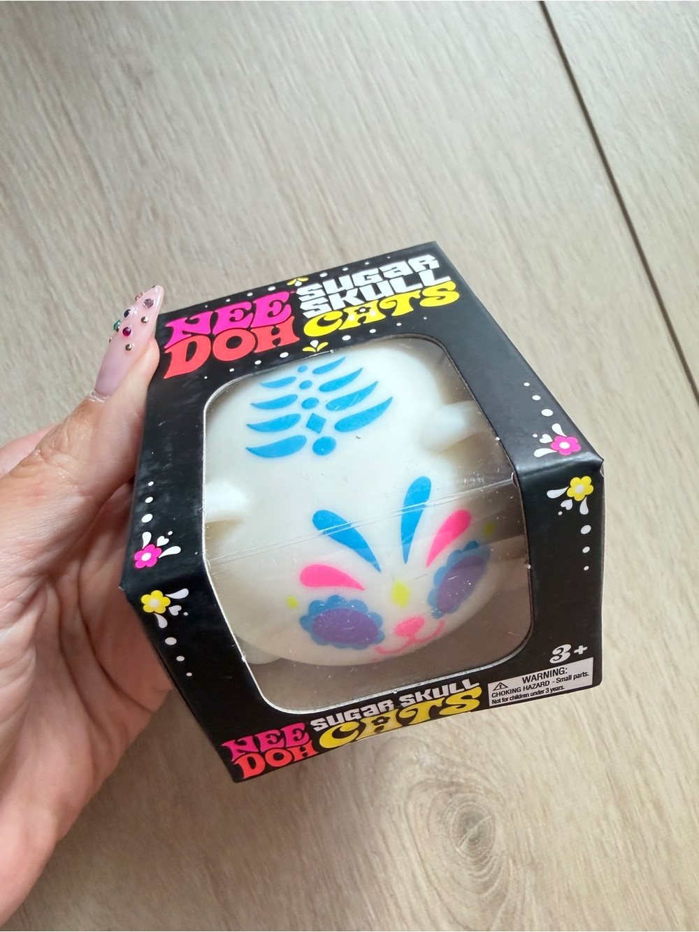 Brand New NeeDoh Sugar Skull Cats Squishy Toy — White with Blue & Pink Accents